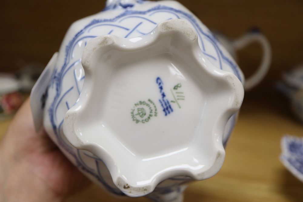 Two Royal Copenhagen blue and white onion pattern teapots, a lidded tureen and an hors doeuvres dish, tallest 17cm